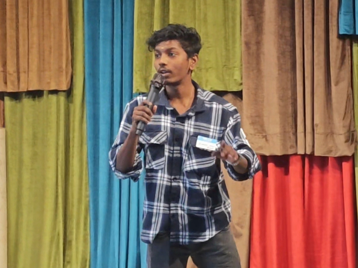 Boobesh AG speaking at an event
